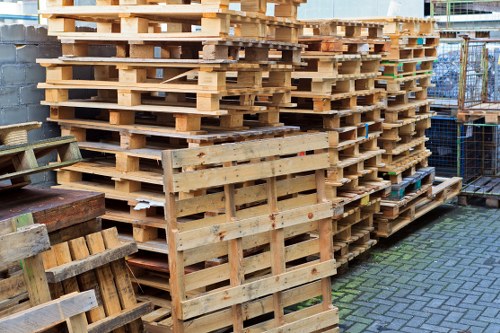 Volunteers and charity partners selecting donated furniture